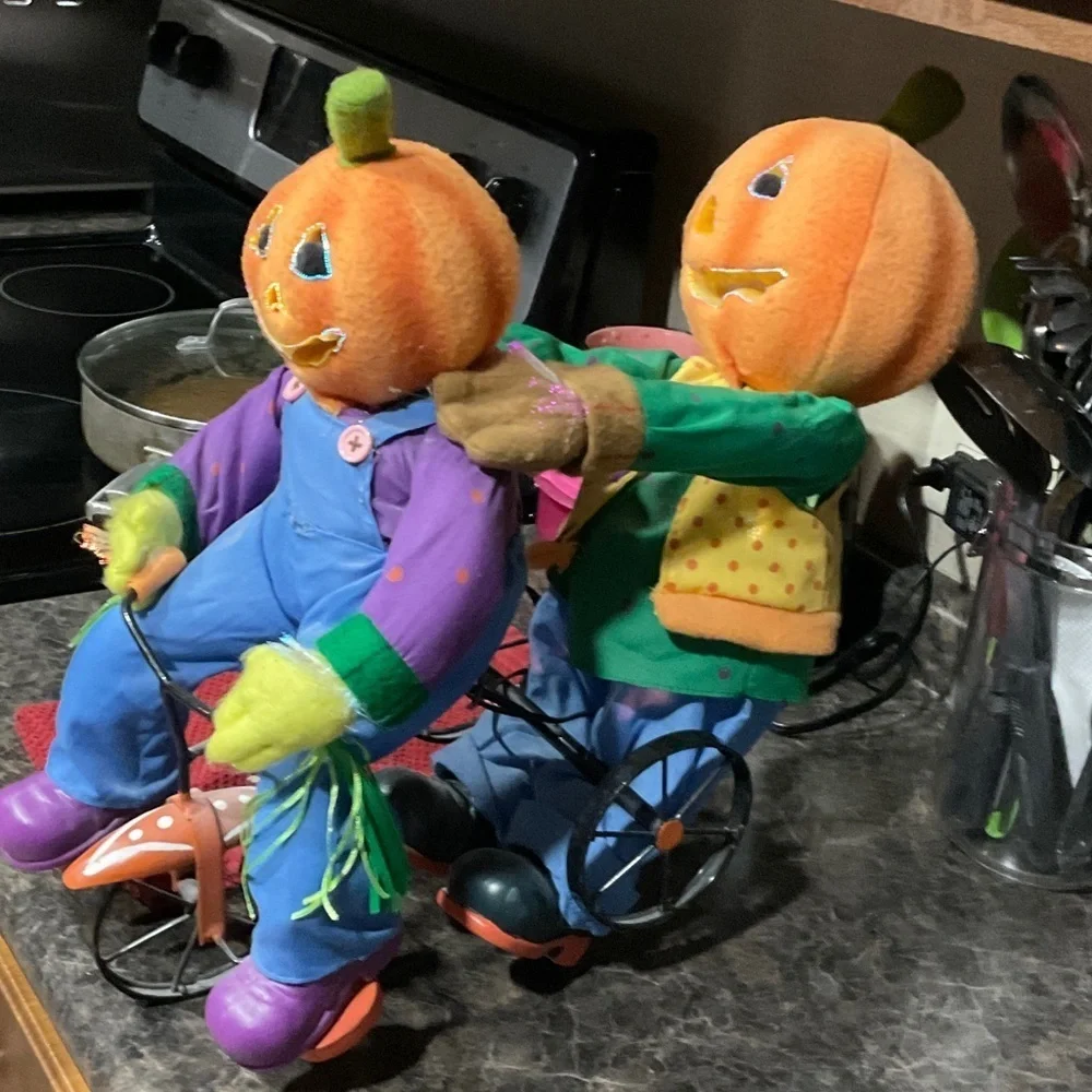 Festive Pumpkin Head Decor with Blue Overalls